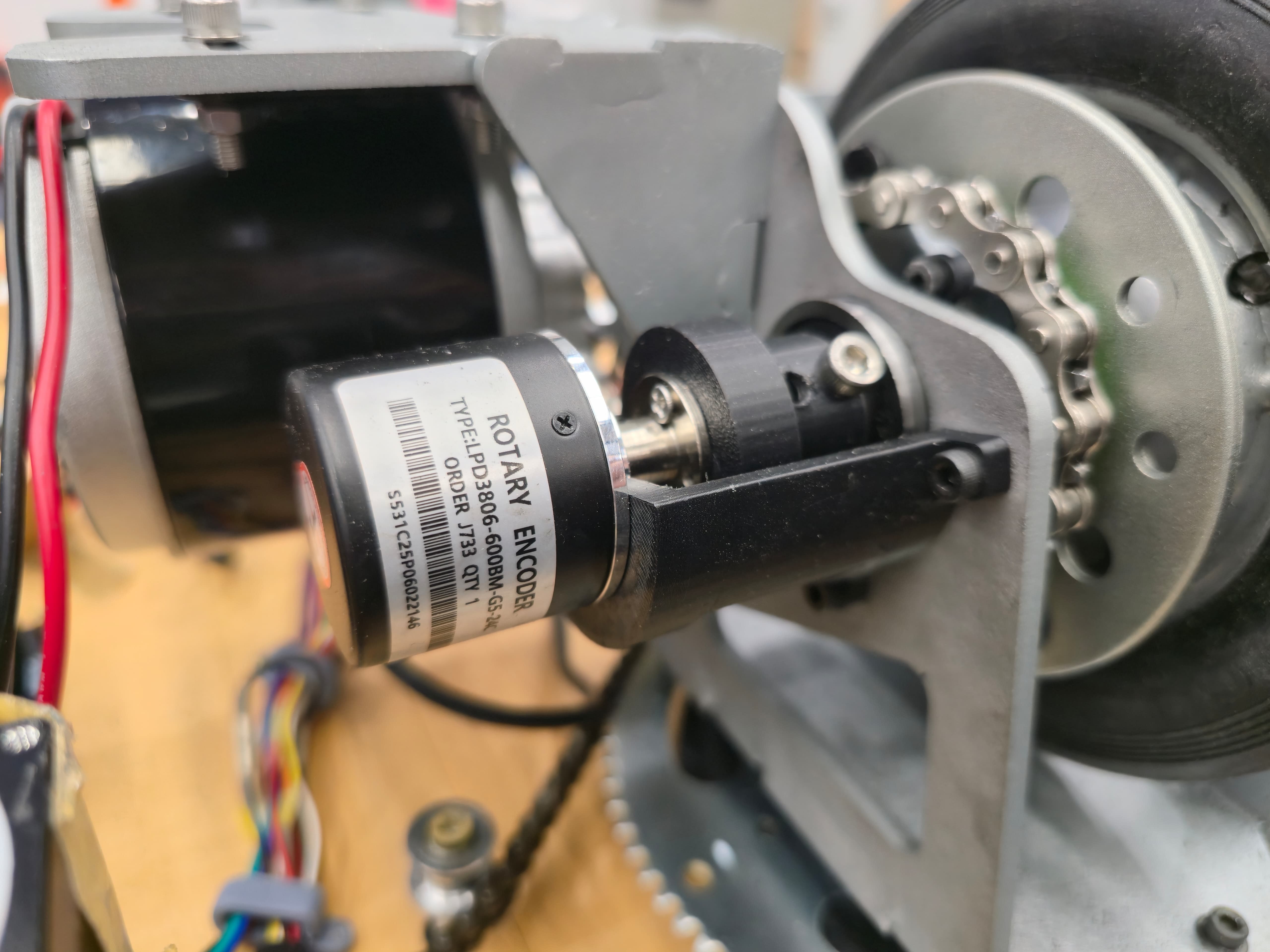 LPD3806 rotary encoder mounted on wheel shaft